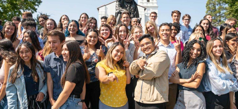 Students standing together in front of the saint mary's college chapel